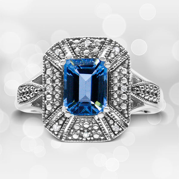 .925 Sterling Silver Diamond Accent and 8X6 mm Emerald-Shape Blue Topaz Ring (I-J Color, I2-I3 Clarity) - Ring Size 7