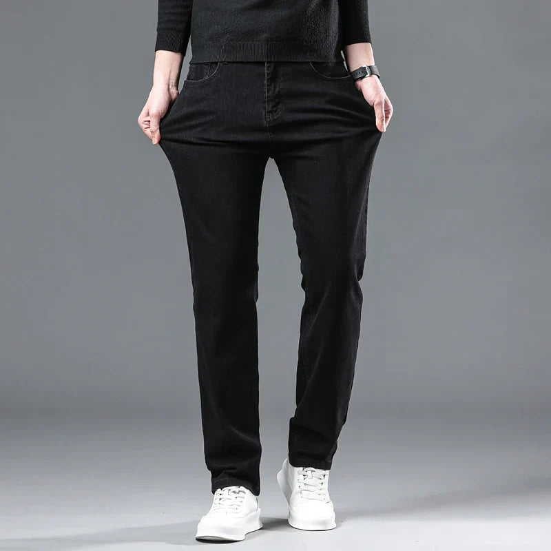 2024 New Winter Pure Black Fleece Thick Warm Jeans Men's loose Straight Elastic Denim Pants classics Casual Plush Trousers