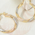 Twisted Radiance : Boucles d'oreilles crochetées de luxe en acier inoxydable